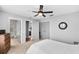 This spacious bedroom features neutral decor, ample closet space, and natural light, creating a serene atmosphere at 10986 Ledgement Ln, Windermere, FL 34786
