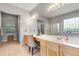 Large main bathroom with double vanities, a glass enclosed shower and soaking tub at 10986 Ledgement Ln, Windermere, FL 34786