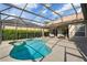 Enjoy a refreshing dip in this screened-in pool and lanai, perfect for outdoor relaxation and entertaining at 10986 Ledgement Ln, Windermere, FL 34786