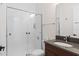 Bathroom features a glass shower, a modern sink, and bright lighting at 13831 Briand Ave, Orlando, FL 32827