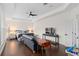 Spacious primary bedroom with hardwood floors, high ceilings, and ample natural light at 13831 Briand Ave, Orlando, FL 32827