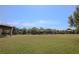 Expansive community green space with picnic shelters and scenic neighborhood views at 13831 Briand Ave, Orlando, FL 32827