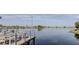 Picturesque lake view from a waterfront deck with outdoor seating and serene atmosphere at 13831 Briand Ave, Orlando, FL 32827