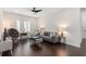 Bright living room featuring modern decor, hardwood floors, and recessed lighting at 13831 Briand Ave, Orlando, FL 32827