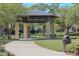Scenic park gazebo surrounded by lush greenery and paved walkways, offering a peaceful community space at 13831 Briand Ave, Orlando, FL 32827