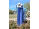 Unique blue metal sculpture adorns the community's green space, adding an artistic flair at 13831 Briand Ave, Orlando, FL 32827