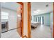 Bedroom with an adjacent laundry room and calming blue accents at 1518 Mississippi Ave, St Cloud, FL 34769