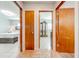 Hallway providing access to a bedroom and an office at 1518 Mississippi Ave, St Cloud, FL 34769
