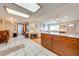 This home features an open floor plan with the kitchen island and living room in the background at 1518 Mississippi Ave, St Cloud, FL 34769