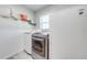 Laundry room with shelving, a washer, and a dryer at 1518 Mississippi Ave, St Cloud, FL 34769