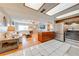 Open concept living room with hardwood floors, recessed lights, and smooth flow to the kitchen at 1518 Mississippi Ave, St Cloud, FL 34769