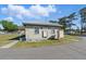 View of a charming community clubhouse near a paved street at 1622 Marlin St, St Cloud, FL 34771