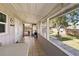 Relaxing covered patio area with tile flooring and open backyard views at 1622 Marlin St, St Cloud, FL 34771