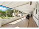 Enjoy an enclosed patio area with tiled floor and a sun-filled yard at 1622 Marlin St, St Cloud, FL 34771