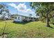 Charming single-story home featuring a well-maintained lawn and exterior at 1622 Marlin St, St Cloud, FL 34771