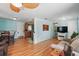 Inviting living room seamlessly connected to the dining area and kitchen, perfect for entertaining at 1622 Marlin St, St Cloud, FL 34771