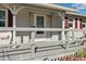 Cozy front porch with comfortable seating and charming details, enhancing curb appeal at 1622 Marlin St, St Cloud, FL 34771