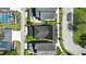 A bird's eye view shows a backyard oasis with a pool and meticulously landscaped yard at 205 Norfolk Pl, Celebration, FL 34747