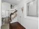 Elegant foyer with hardwood floors, staircase, and bright, welcoming atmosphere at 205 Norfolk Pl, Celebration, FL 34747