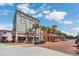 Charming street view featuring shops, restaurants, and well-maintained sidewalks, creating a vibrant atmosphere at 205 Norfolk Pl, Celebration, FL 34747