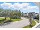 Charming neighborhood street featuring well-maintained lawns and beautiful, traditional-style homes at 205 Norfolk Pl, Celebration, FL 34747