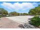 Recreational sand volleyball court with manicured landscaping in a Gathering-friendly community at 205 Norfolk Pl, Celebration, FL 34747
