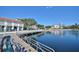 Waterfront view from the dock with a cafe and shops nearby offering dining and retail options at 205 Norfolk Pl, Celebration, FL 34747