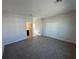 Spacious bedroom with carpet flooring, ensuite bathroom and double door closet at 231 Villa Domani Cir # 59, Davenport, FL 33896