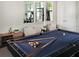 Inviting game room featuring a stylish pool table, cozy seating, and access to the fitness center at 231 Villa Domani Cir # 59, Davenport, FL 33896