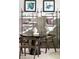 Stylish community lounge area with shelving, seating, and decorative artwork at 231 Villa Domani Cir # 59, Davenport, FL 33896