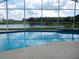 Enjoy the screened in-ground pool with its gorgeous view of the nearby pond at 3007 Bransbury Ct, Kissimmee, FL 34747