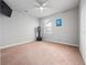 Minimalist bedroom with a window and a heavy-bag provides workout potential at 3675 Cabo Ln, St Cloud, FL 34772