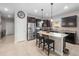 Modern kitchen with granite countertops, stainless steel appliances, and center island at 3675 Cabo Ln, St Cloud, FL 34772