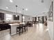Bright, open floor plan featuring a spacious kitchen, dining, and living area at 3675 Cabo Ln, St Cloud, FL 34772