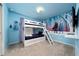 Themed bunk bedroom with a Disney Frozen mural and a wall-mounted TV at 4002 Lana Ave, Davenport, FL 33897