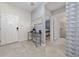 An inviting entryway leads to the bedroom and bathroom, enhanced by a modern design aesthetic at 4002 Lana Ave, Davenport, FL 33897