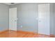 Clean bedroom boasts hardwood floors and two closets for ample storage at 4531 Lake Trudy Dr, St Cloud, FL 34769