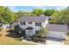 Charming two-story home with manicured lawn and attached garage at 4531 Lake Trudy Dr, St Cloud, FL 34769