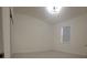 Empty bedroom with carpet, white walls, and a single window with shades at 4952 Shady Pines Dr, St Cloud, FL 34772