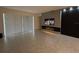 Open-concept living room with a modern fireplace feature wall at 4952 Shady Pines Dr, St Cloud, FL 34772