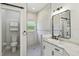 Primary bathroom showcasing a walk-in shower, designer tile, modern fixtures, and a toilet room at 531 Barcelona Dr, Poinciana, FL 34759