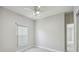Bedroom with ceiling fan and window at 531 Barcelona Dr, Poinciana, FL 34759
