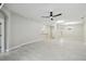 Expansive living area with tile floors, neutral colors, and plenty of natural light at 531 Barcelona Dr, Poinciana, FL 34759