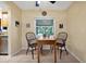 Eat-in kitchen with a window view of the outside and decorative appointments at 541 Rebecca Dr, St Cloud, FL 34769
