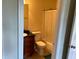 Bathroom with dark vanity, tile flooring, and shower-tub combo with a curtain at 6148 Westgate Dr # 302, Orlando, FL 32835