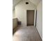 Carpeted room with a bi-fold closet with an open door at 6148 Westgate Dr # 302, Orlando, FL 32835