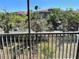 View from a screened balcony featuring condo buildings at 6148 Westgate Dr # 302, Orlando, FL 32835