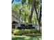 Central Park MetroWest Condominiums sign surrounded by lush landscaping at 6148 Westgate Dr # 302, Orlando, FL 32835