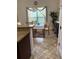 Inviting dining space featuring tiled floors and decor, perfect for Gathering meals at 619 Tapatio Ln, Kissimmee, FL 34759