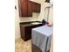 Laundry room featuring cabinets and a countertop with a sink at 619 Tapatio Ln, Kissimmee, FL 34759